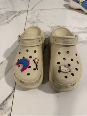 CROCS Kids Cream Clogs with Colorful Charm Accents